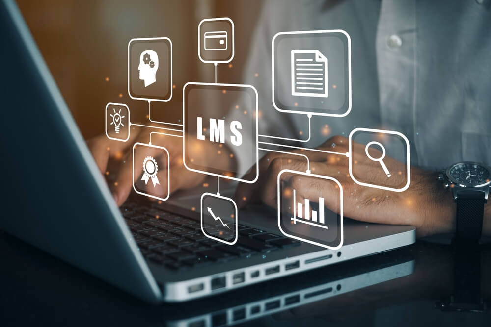 LMS and learning icons with man using computer as background