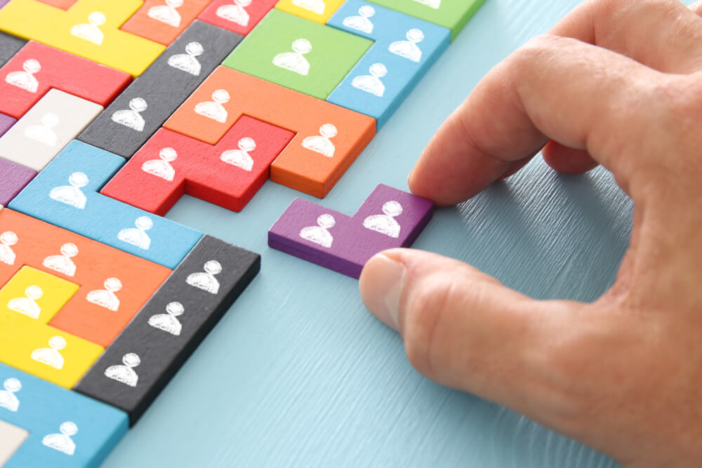tangram puzzle blocks with people icons
