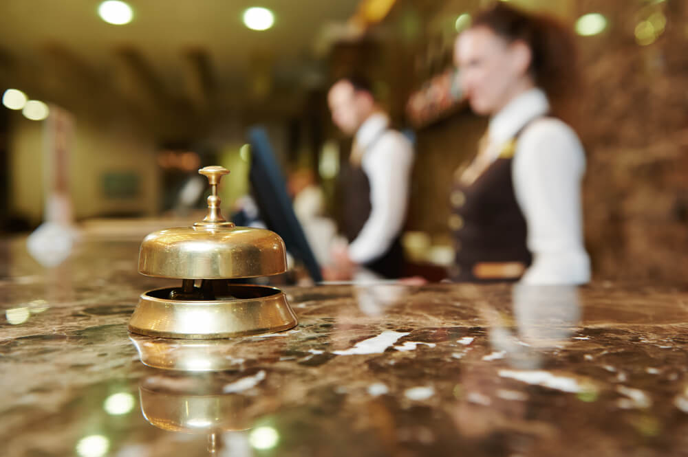 Customer service representatives smiling while working