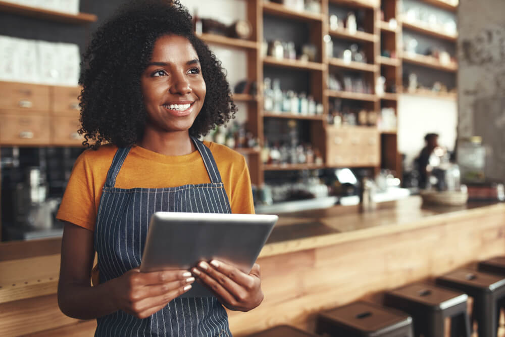 Customer service representatives smiling while working