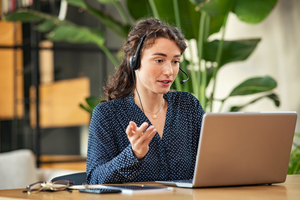 Customer service representatives smiling while working