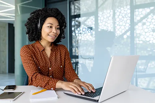 customer service representatives smiling while working