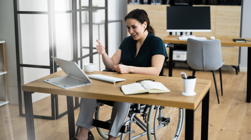 A person with a disability taking an online course in hospitality
