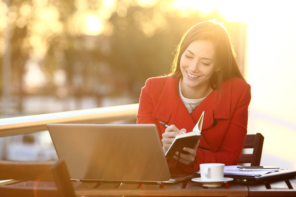 Customer service representatives smiling while working