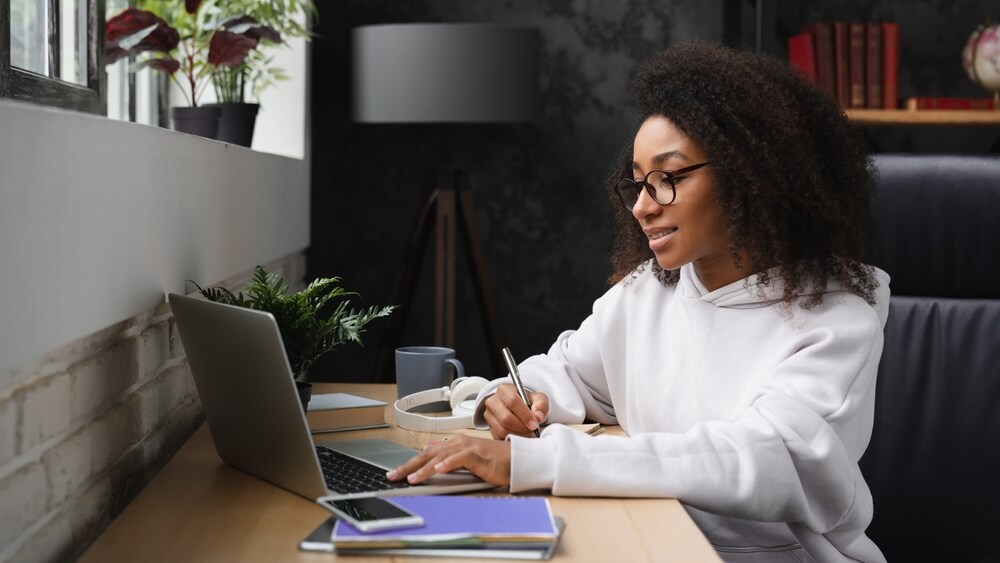 African American student taking flexible online courses at her own pace