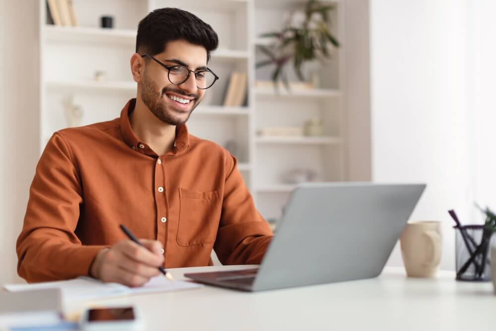 Customer service representatives smiling while working