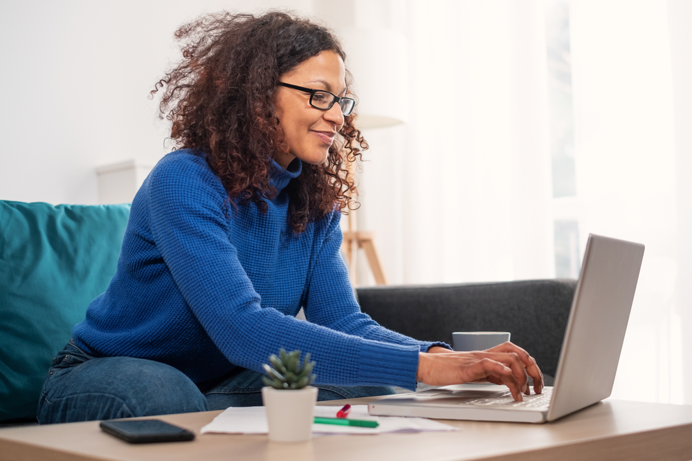 Customer service representatives smiling while working