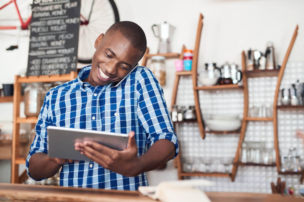 Customer service representatives smiling while working