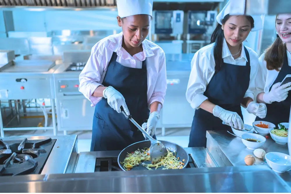 Customer service representatives smiling while working