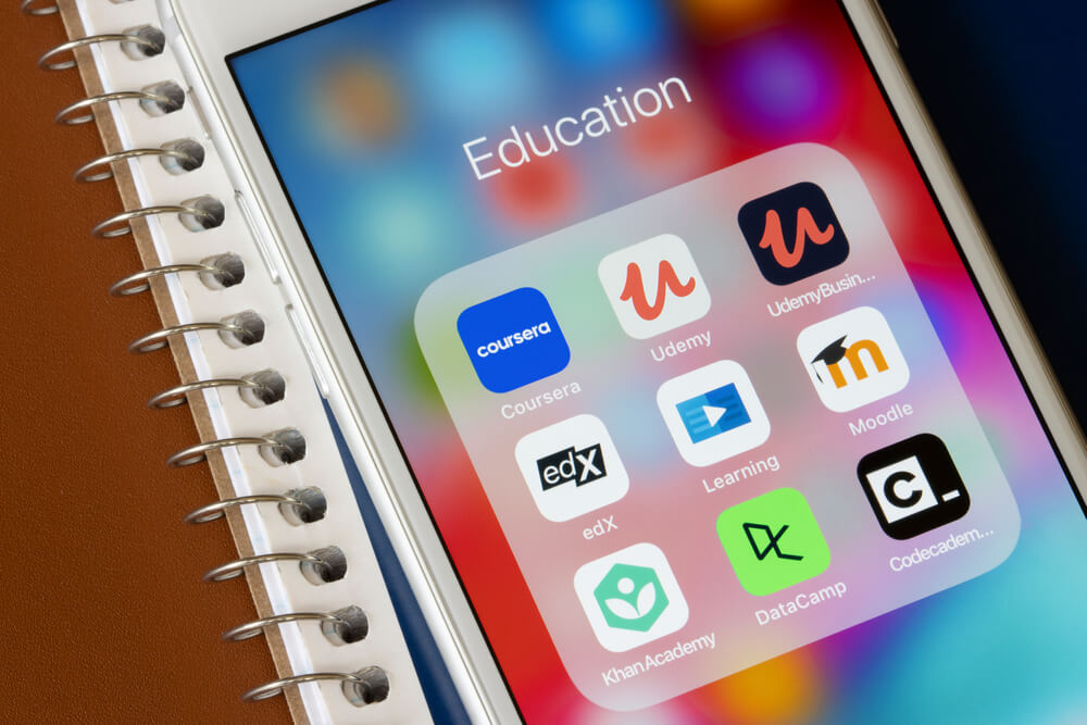 assorted educational lms apps seen on mobile phone